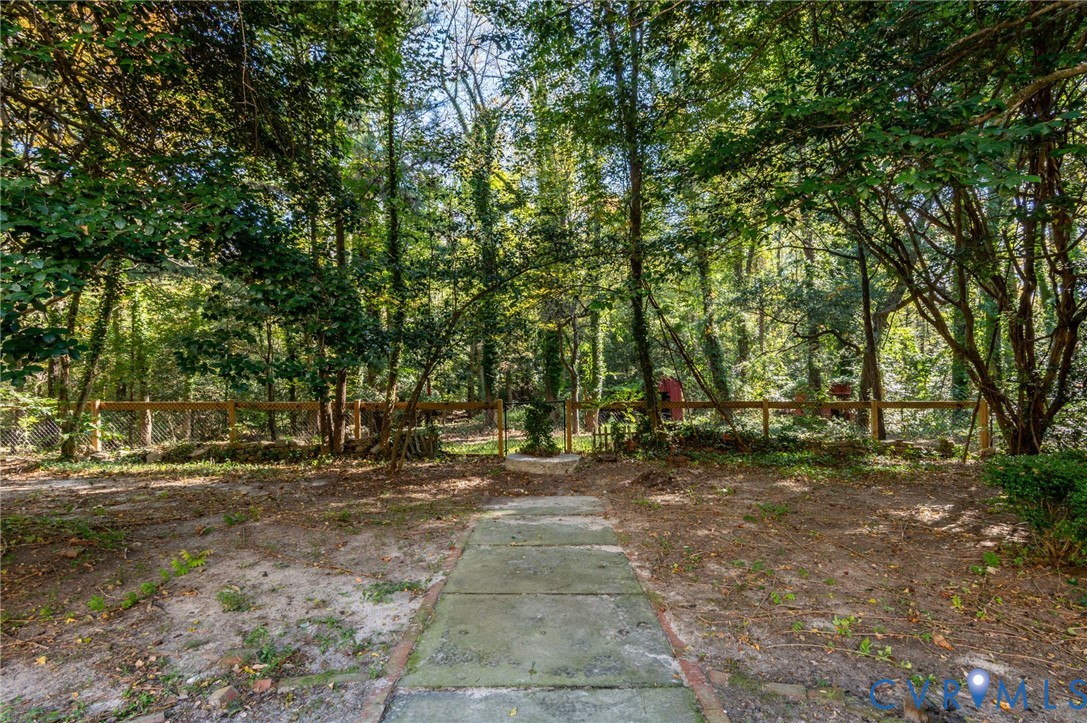 323 Church Street Wakefield, VA 23888 - Photo 42 of 50 a backyard of a house with lots of green space