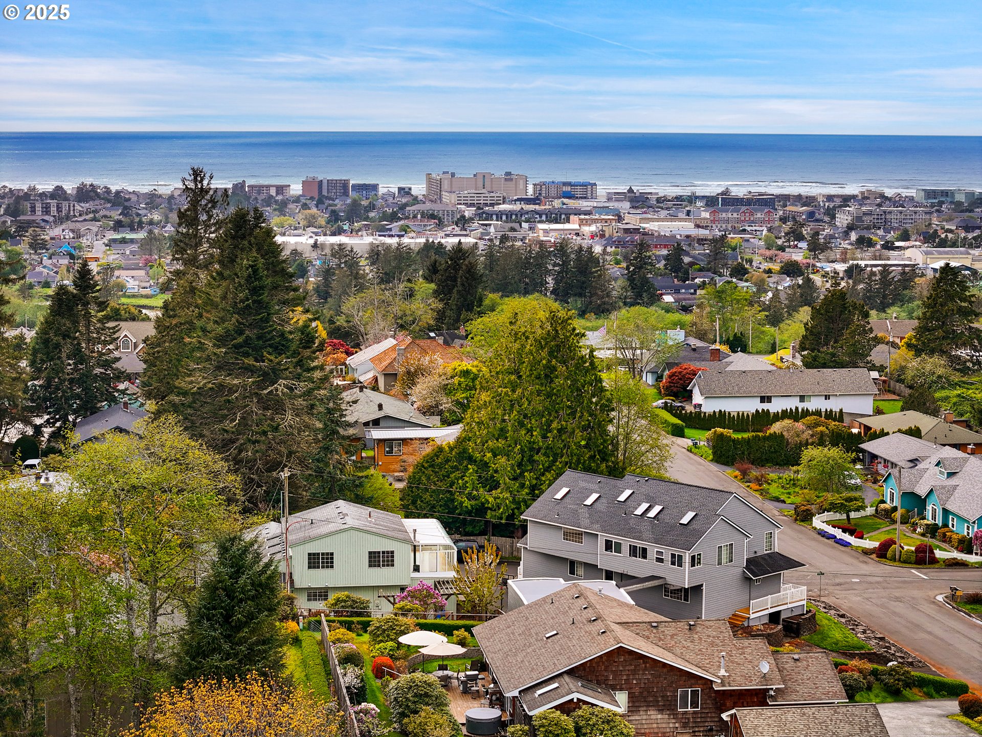 343 Hemlock Street Seaside, OR 97138 - Photo 16 of 17 an aerial view of a house with a lake view