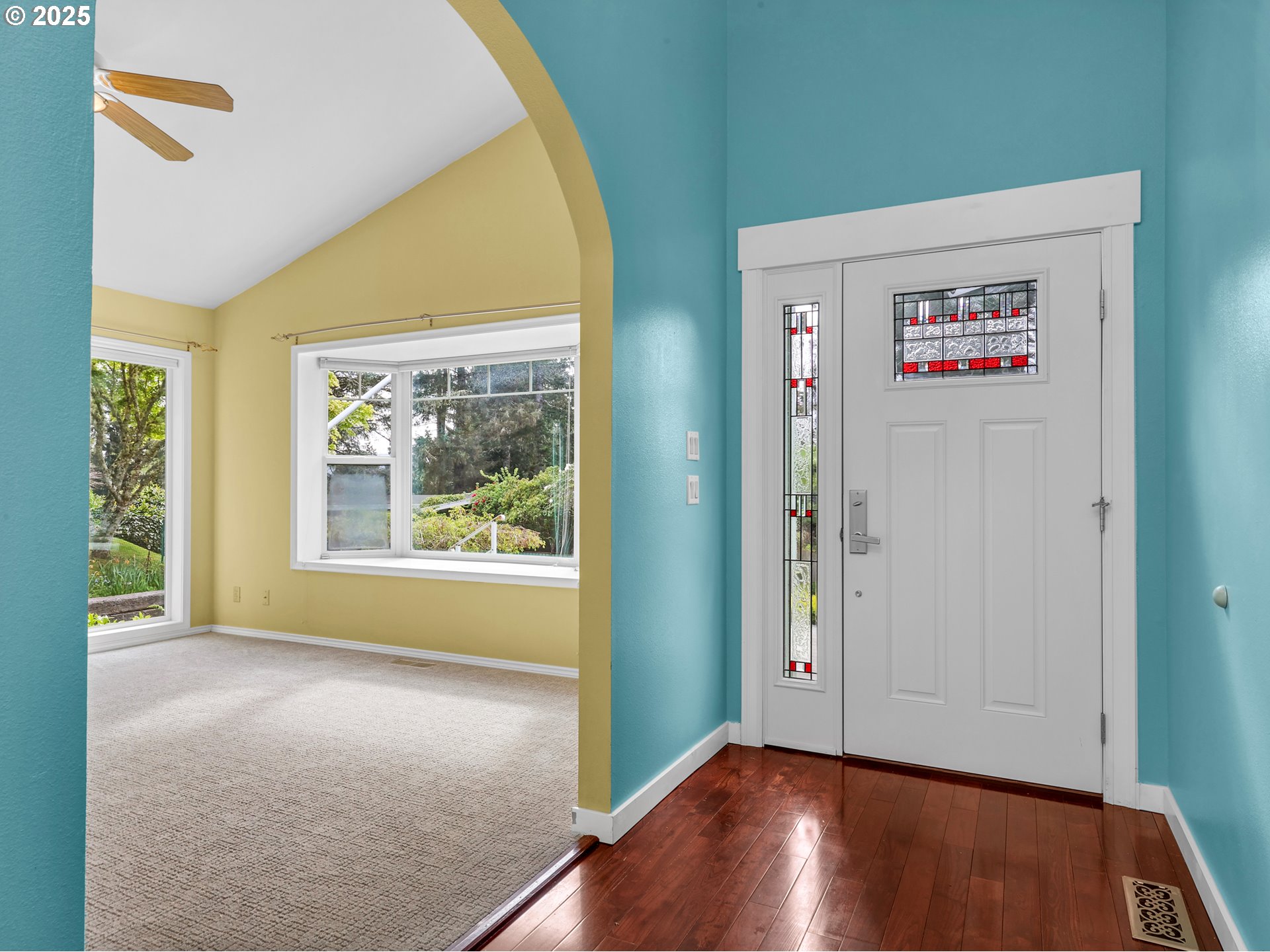 343 Hemlock Street Seaside, OR 97138 - Photo 2 of 17 wooden floor in an empty room with a window