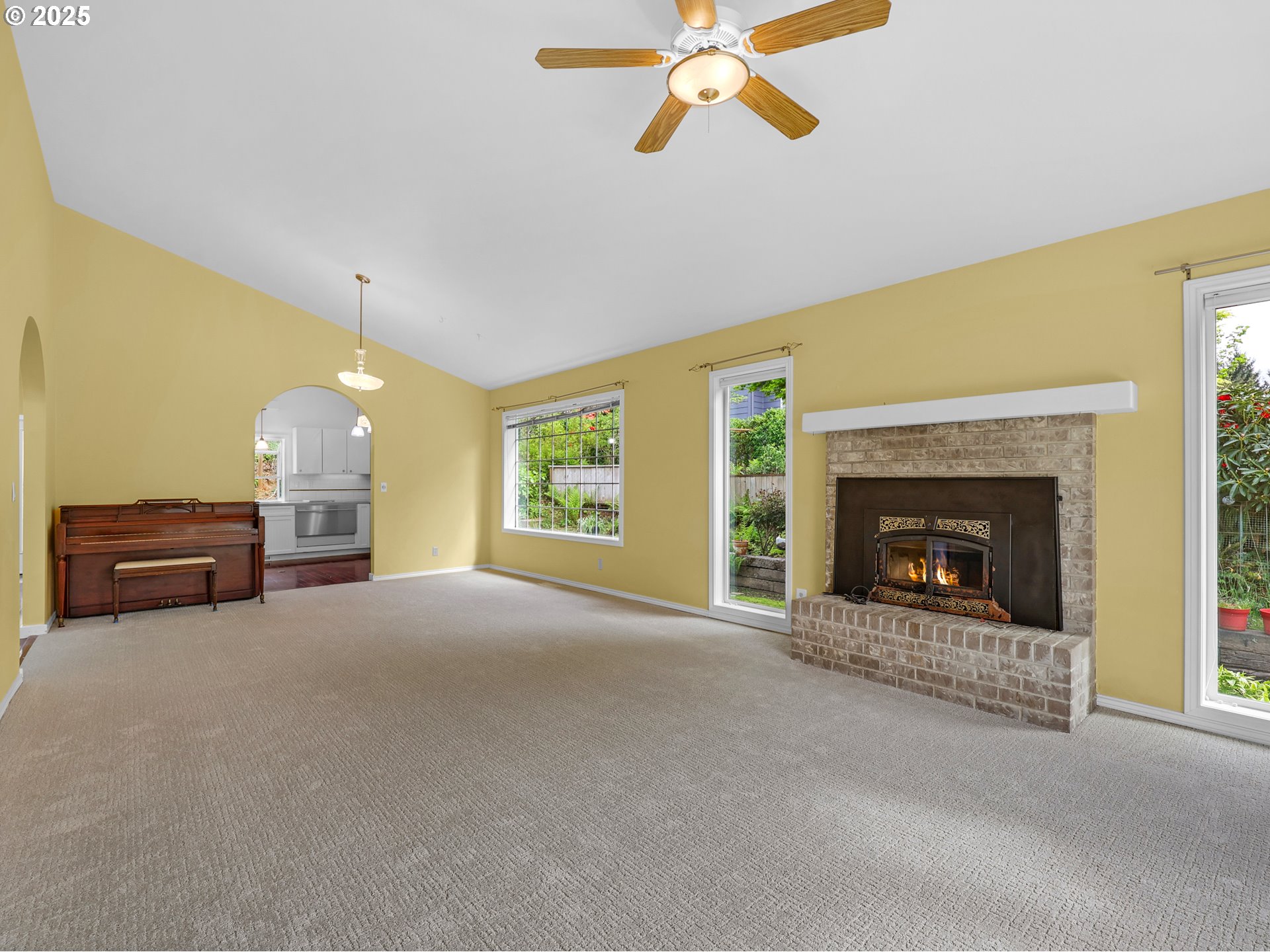 343 Hemlock Street Seaside, OR 97138 - Photo 3 of 17 a view of a livingroom with a fireplace and window