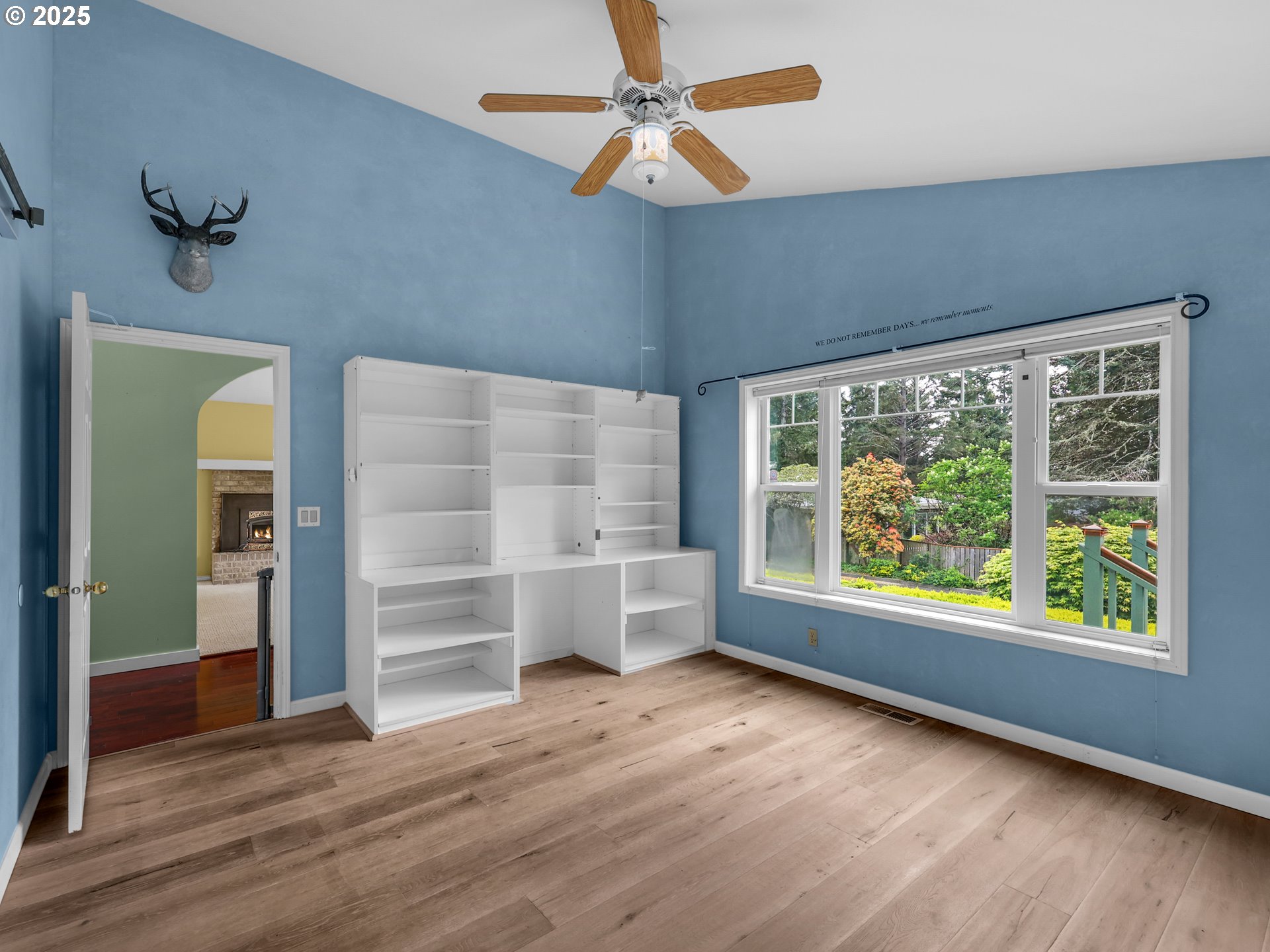 343 Hemlock Street Seaside, OR 97138 - Photo 6 of 17 wooden floor in an empty room with a window
