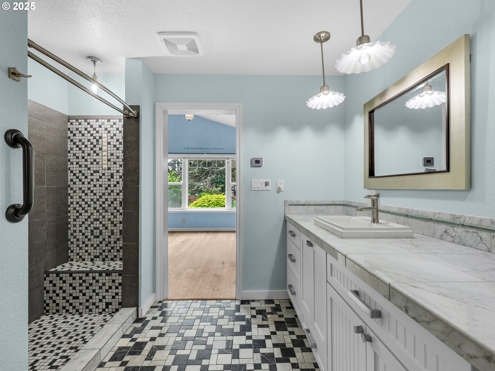 343 Hemlock Street Seaside, OR 97138 - Photo 8 of 17 a bathroom with a sink a toilet and shower