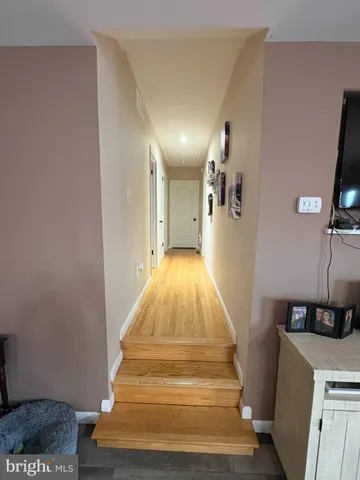 a spacious bathroom with a double vanity sink and a mirror