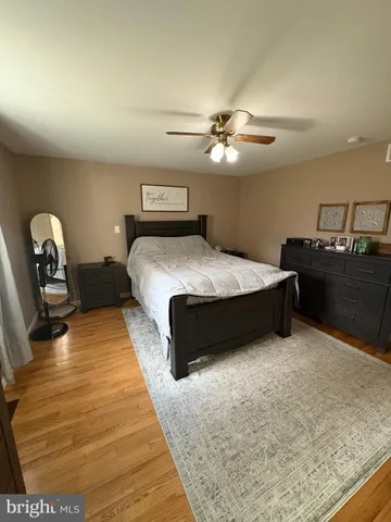 a bathroom with a double vanity sink and mirror