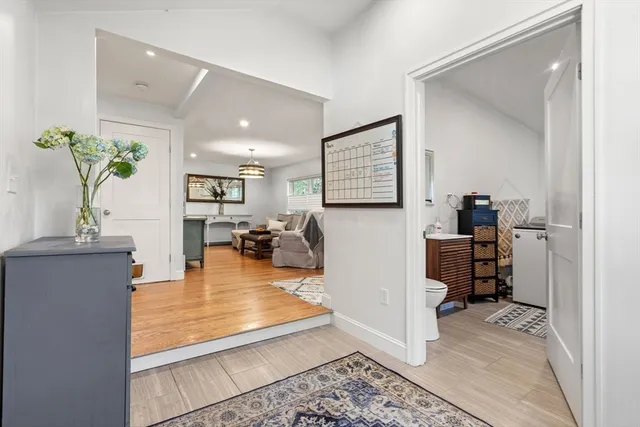 a bathroom with a glass shower door