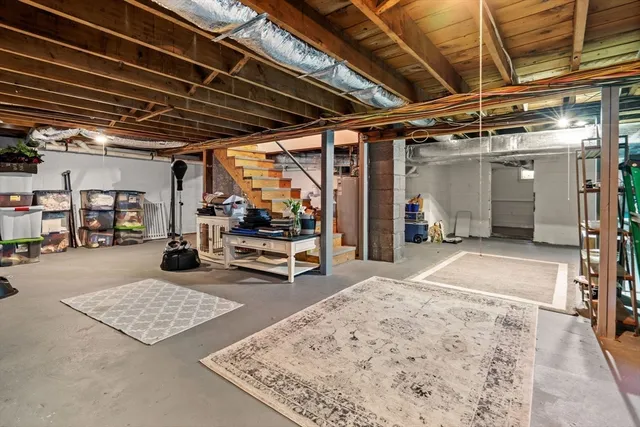 a view of backyard of house with seating space