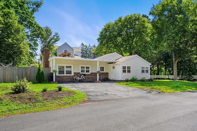 a bedroom with furniture and a flat screen tv