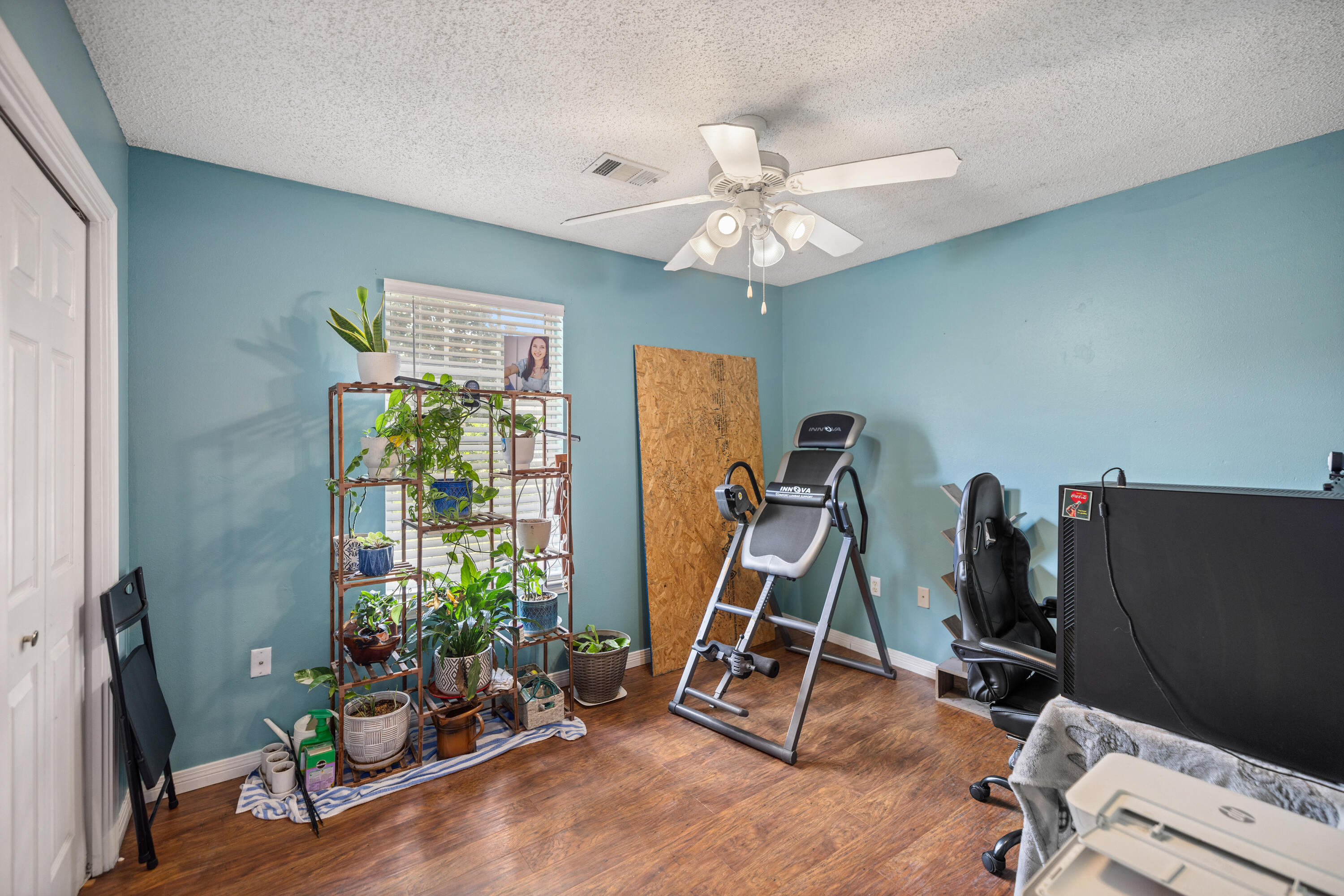 204 Warrior Street Crestview, FL 32536 - Photo 21 of 58 a view of a room with gym equipment