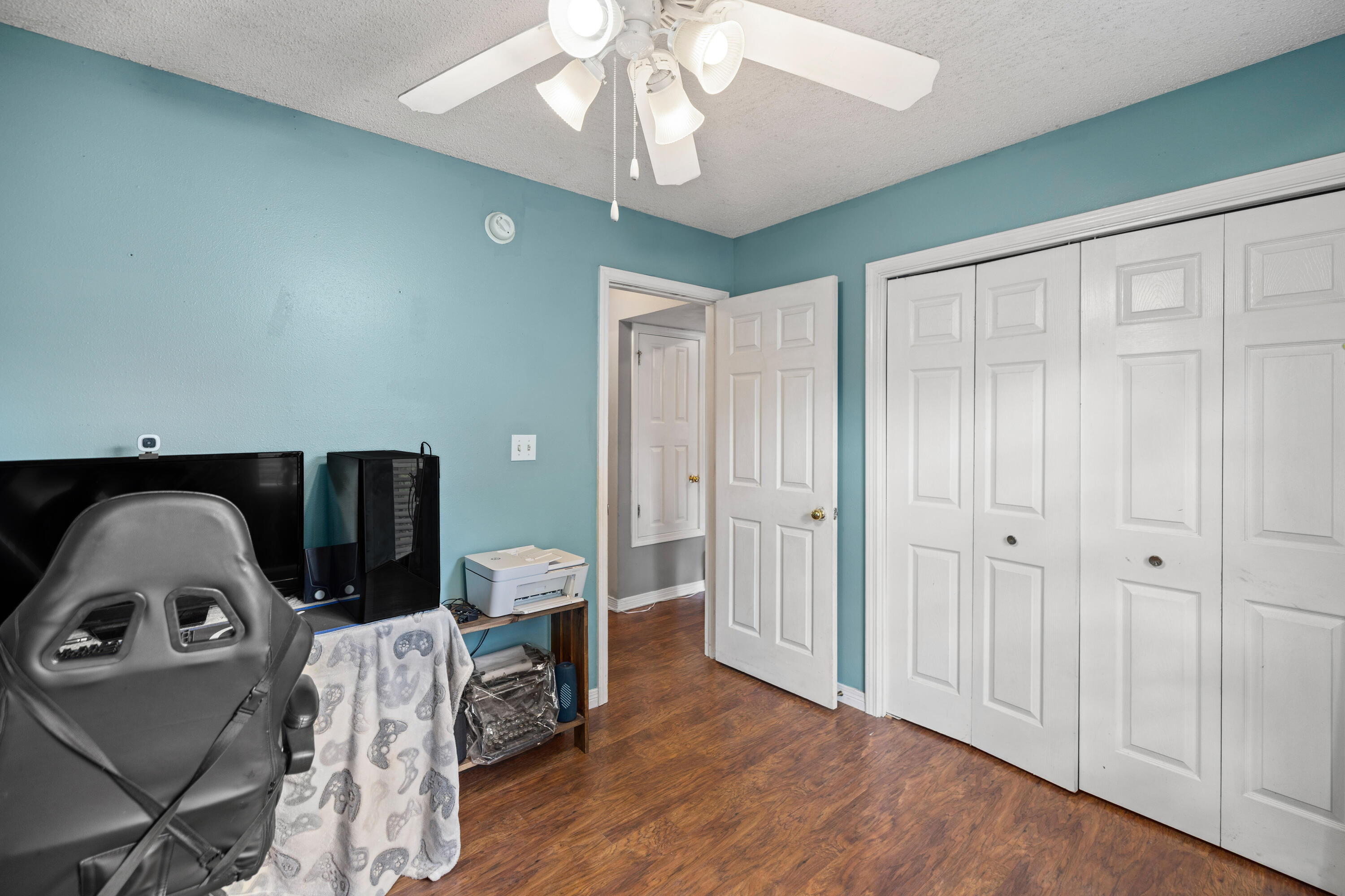 204 Warrior Street Crestview, FL 32536 - Photo 22 of 58 a view of livingroom with furniture and wooden floor