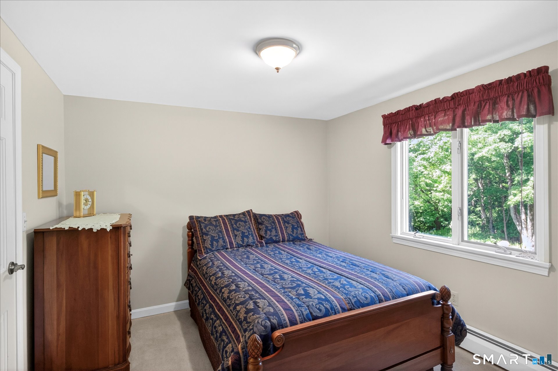 5 Shingle Mill Drive Canton, CT 06019 - Photo 32 of 38 a bedroom with a bed and a window