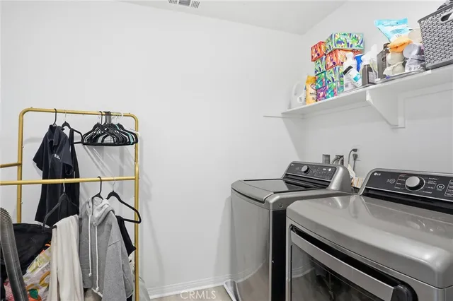 a bed room with a bed and a table