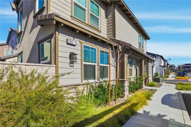 a large kitchen with a table and chairs