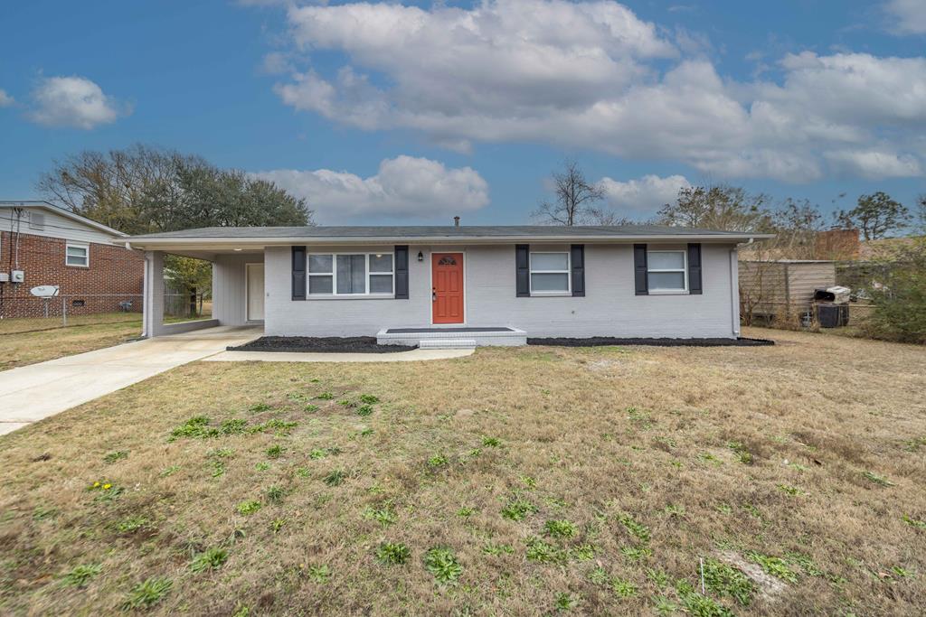 6270 Mill Branch Road Columbus, GA 31907 - Photo 1 of 25 a front view of house with yard and trees around