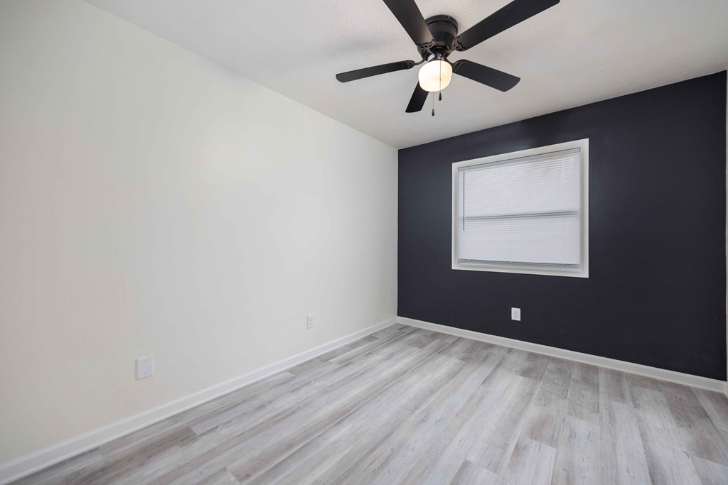 6270 Mill Branch Road Columbus, GA 31907 - Photo 13 of 25 an empty room with windows and fan