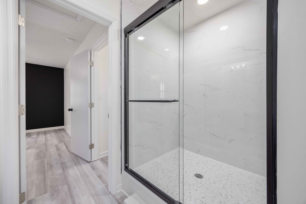 6270 Mill Branch Road Columbus, GA 31907 - Photo 18 of 25 a bathroom with a glass shower door