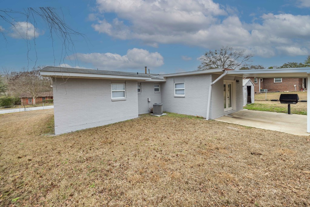 6270 Mill Branch Road Columbus, GA 31907 - Photo 24 of 25 a front view of a house with a yard