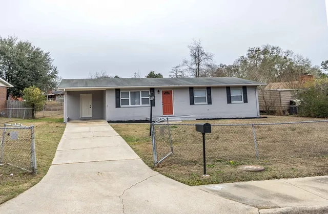 a front view of a house with entertaining space