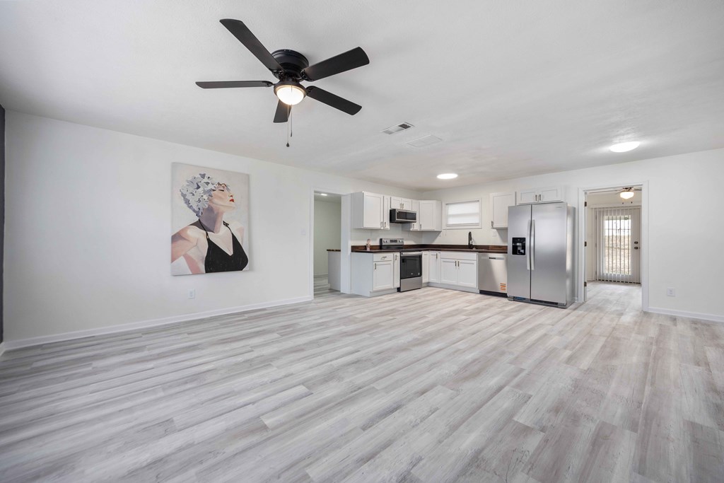 6270 Mill Branch Road Columbus, GA 31907 - Photo 4 of 25 a view of a kitchen with a sink and wooden floor