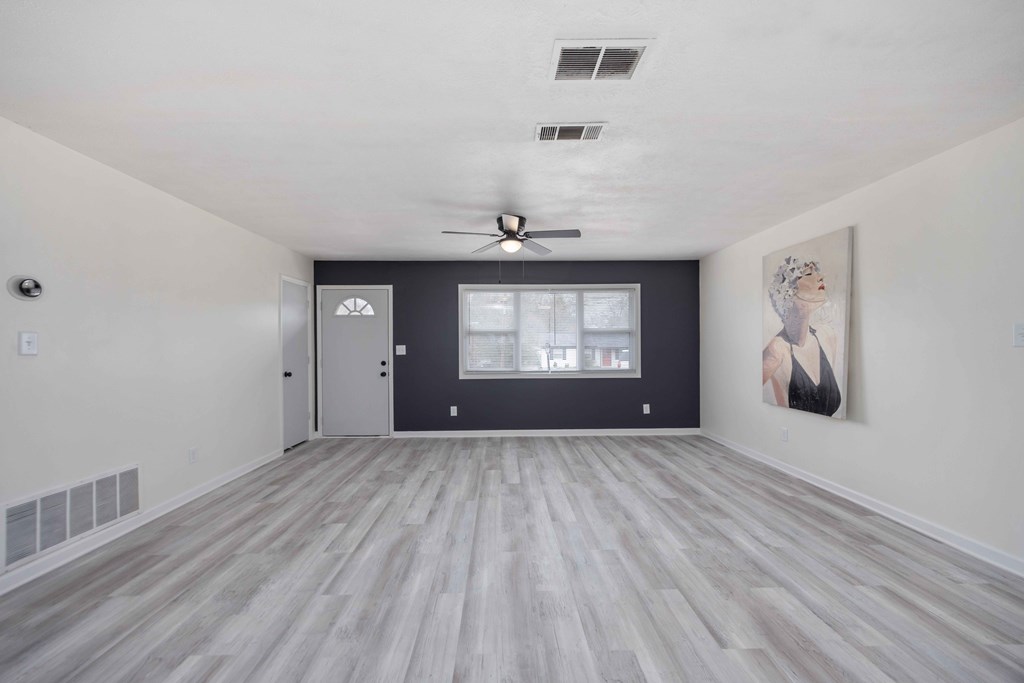 6270 Mill Branch Road Columbus, GA 31907 - Photo 9 of 25 a view of wooden floor and windows in a room