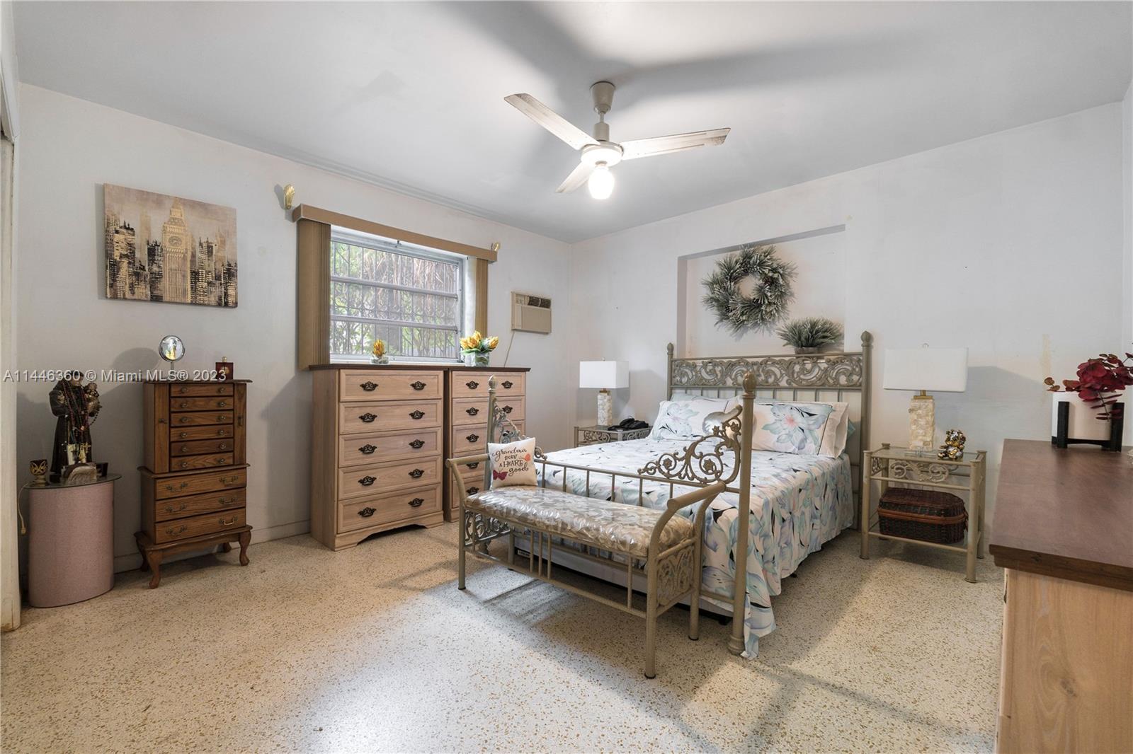 2446 Southwest 15th Street Miami, FL 33145 - Photo 21 of 42 a bed room with furniture and a bed