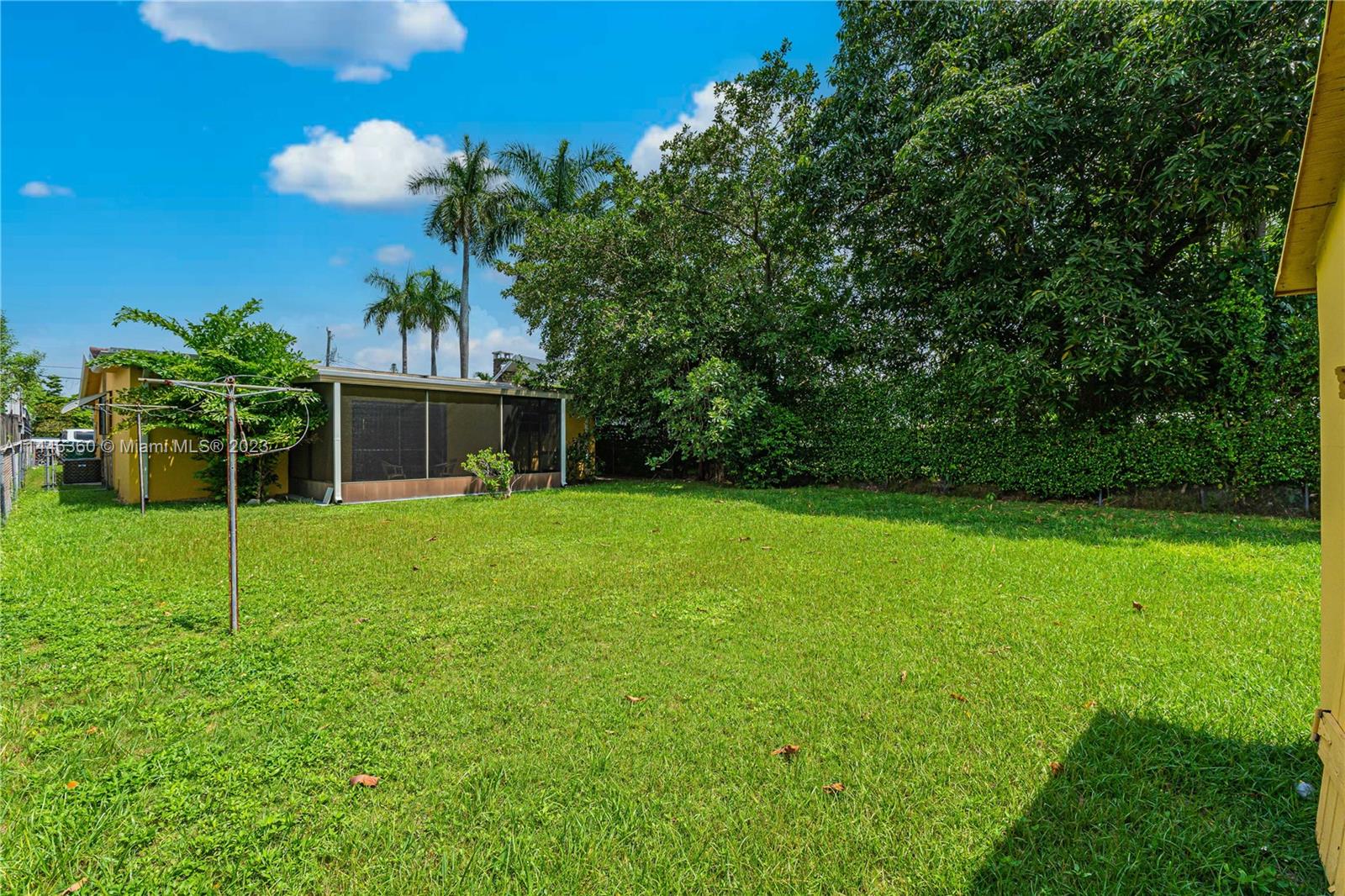 2446 Southwest 15th Street Miami, FL 33145 - Photo 37 of 42 a backyard of a house with lots of green space