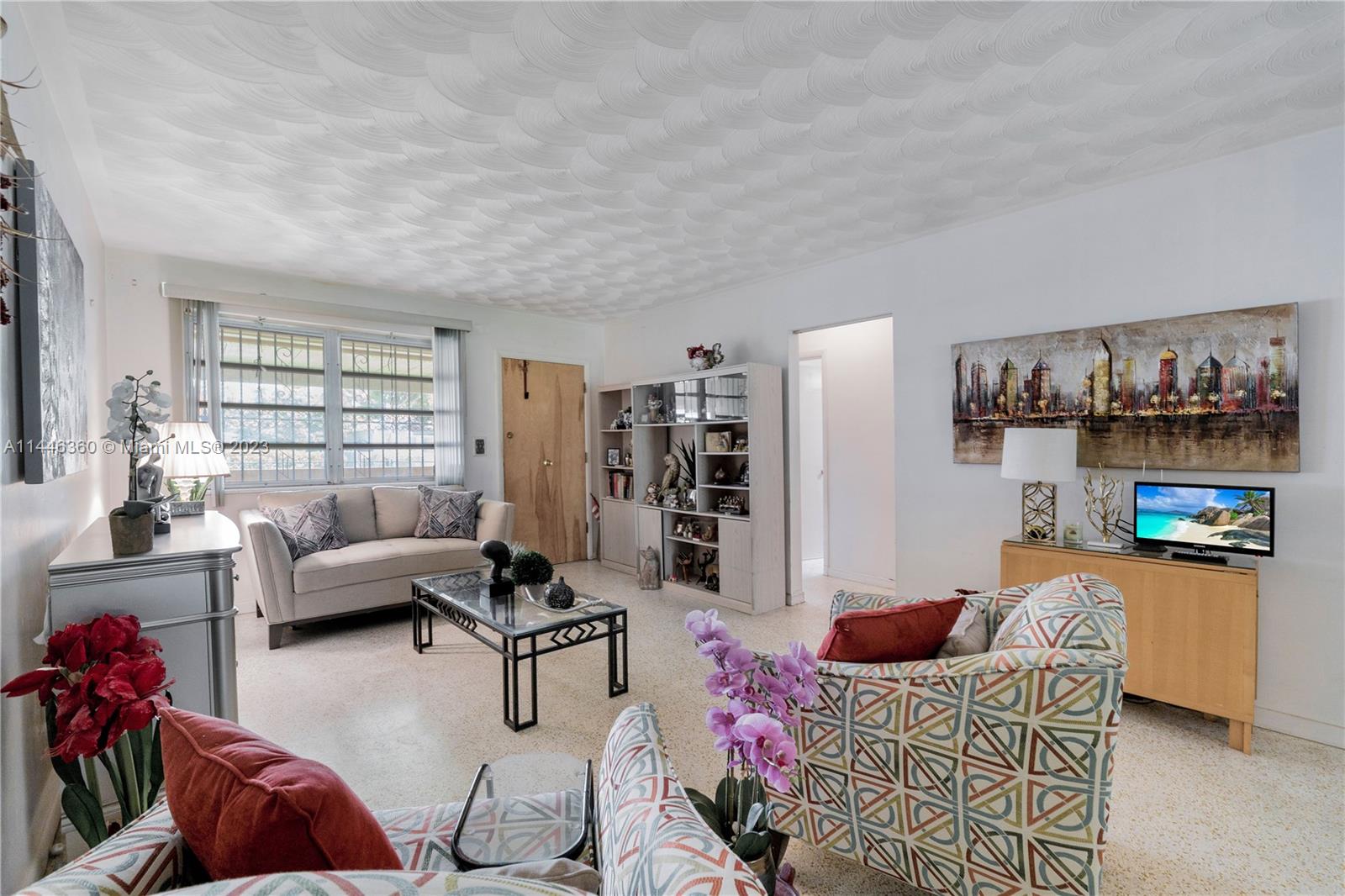 2446 Southwest 15th Street Miami, FL 33145 - Photo 8 of 42 a living room with furniture and a wooden floor