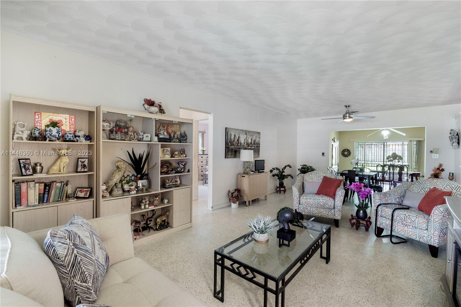 2446 Southwest 15th Street Miami, FL 33145 - Photo 9 of 42 a living room with furniture and a flat screen tv