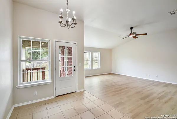 a kitchen with stainless steel appliances a stove sink microwave and cabinets