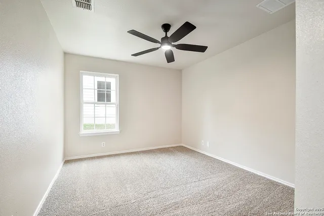 a bathroom with a sink toilet vanity and shower