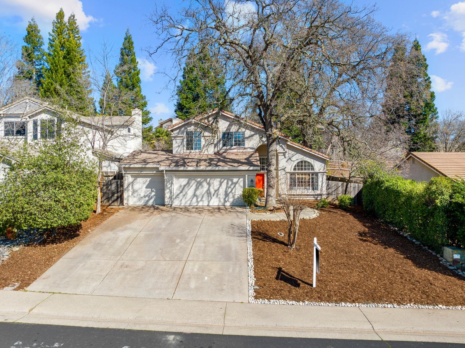 147 Briggs Ranch Drive Folsom, CA 95630 - Photo 1 of 1 a front view of a house with a yard and garage
