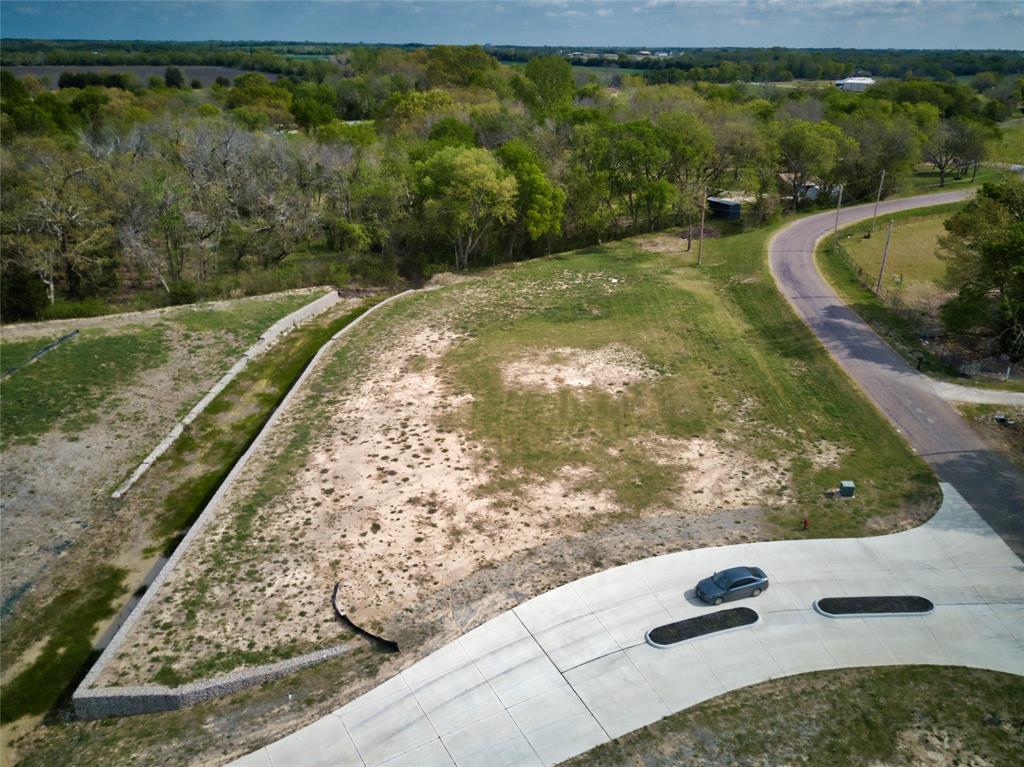 Tbd Tbd Hidden Hills Anna, TX 75409 - Photo 3 of 11 a view of a yard with wooden fence
