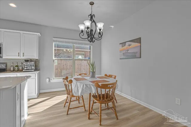a utility room with washer and dryer