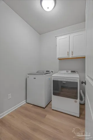 a view of workspace with wooden floor