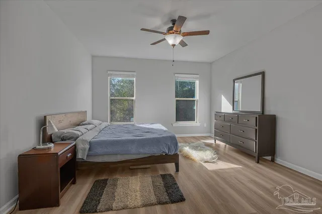 a bathroom with a double vanity sink mirror and