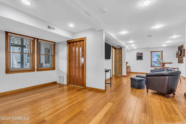 a bathroom with a sink and a window