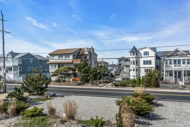 a view of a house with a road