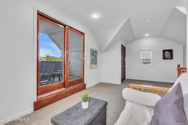 a view of a field with trees in background