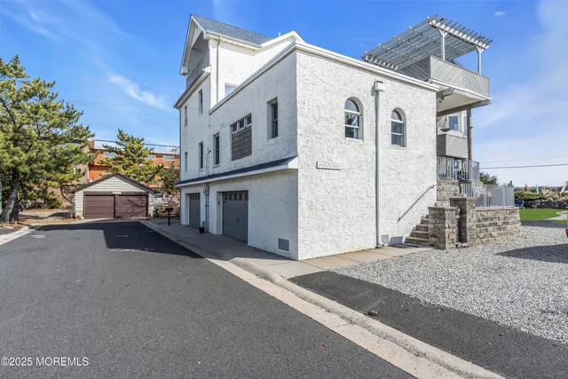 a kitchen with a refrigerator and cabinets