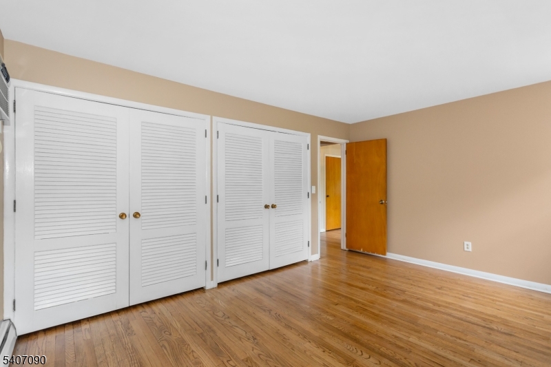 3 Mulberry Terrace Kinnelon, NJ 07405 - Photo 21 of 38 a view of an empty room with wooden floor