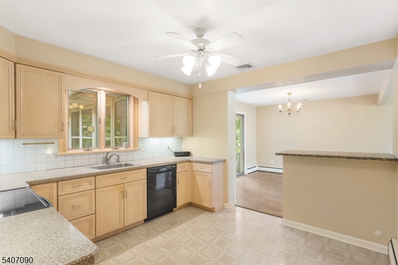3 Mulberry Terrace Kinnelon, NJ 07405 - Photo 10 of 38 a large kitchen with a large window appliances and cabinets