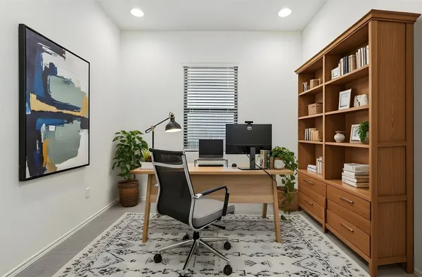 a view of a workspace with furniture