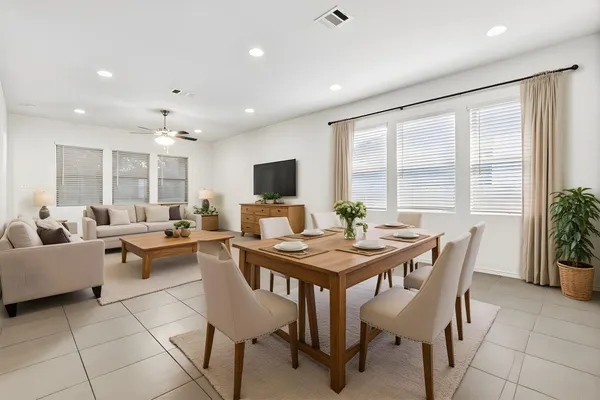 a view of a dining room with furniture