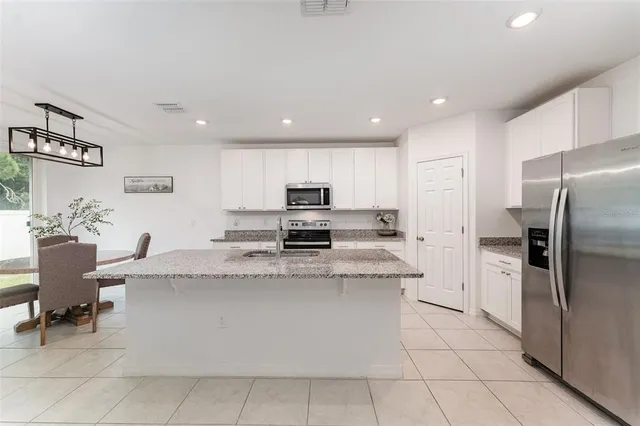 $379,500 | 573 Vista Villages Boulevard, Davenport, FL 33896