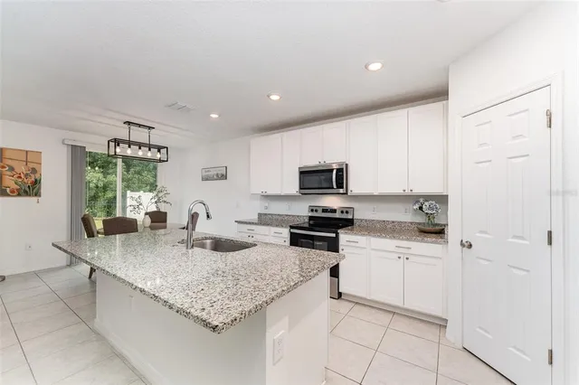 $379,500 | 573 Vista Villages Boulevard, Davenport, FL 33896