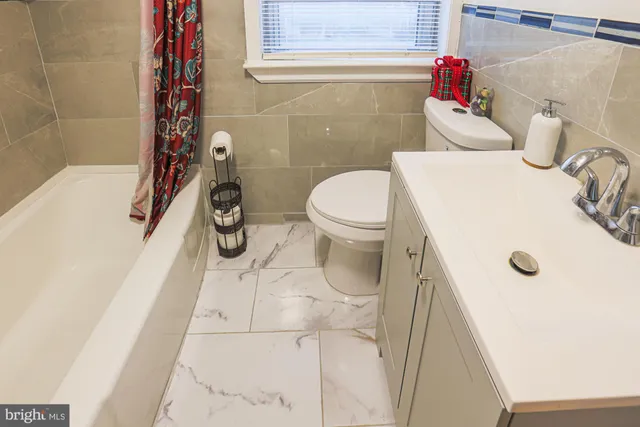 a bathroom with a sink and toilet