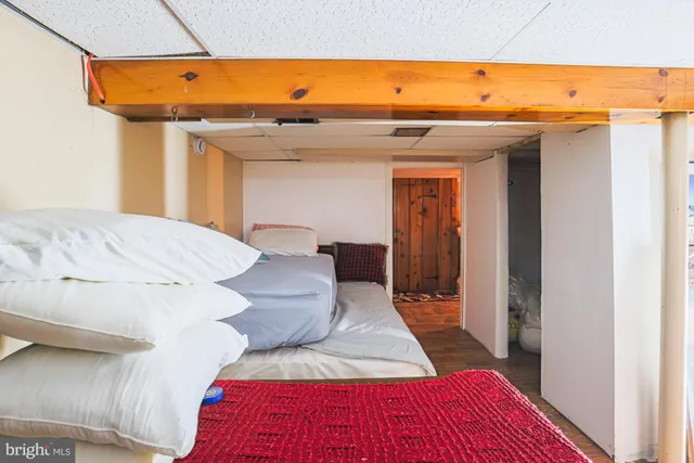 a white toilet sitting next to a bathroom sink