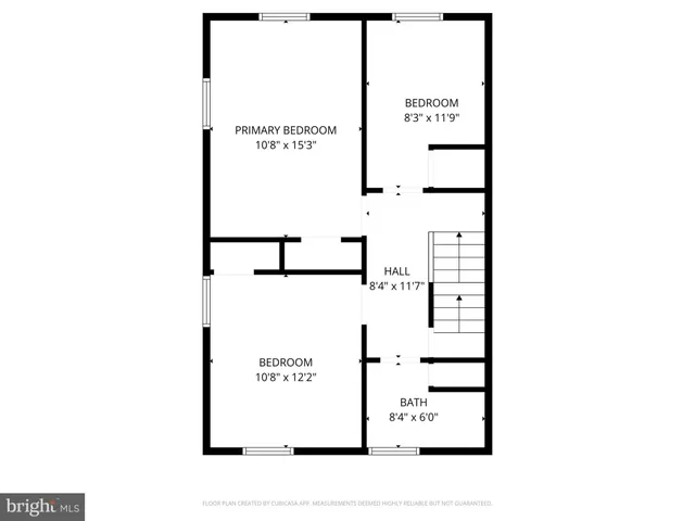 a picture of floor with a black and white wall