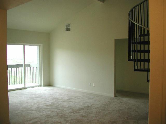 792 Castle Valley Boulevard, Unit A New Castle, CO 81647 - Photo 2 of 4 an empty room with windows