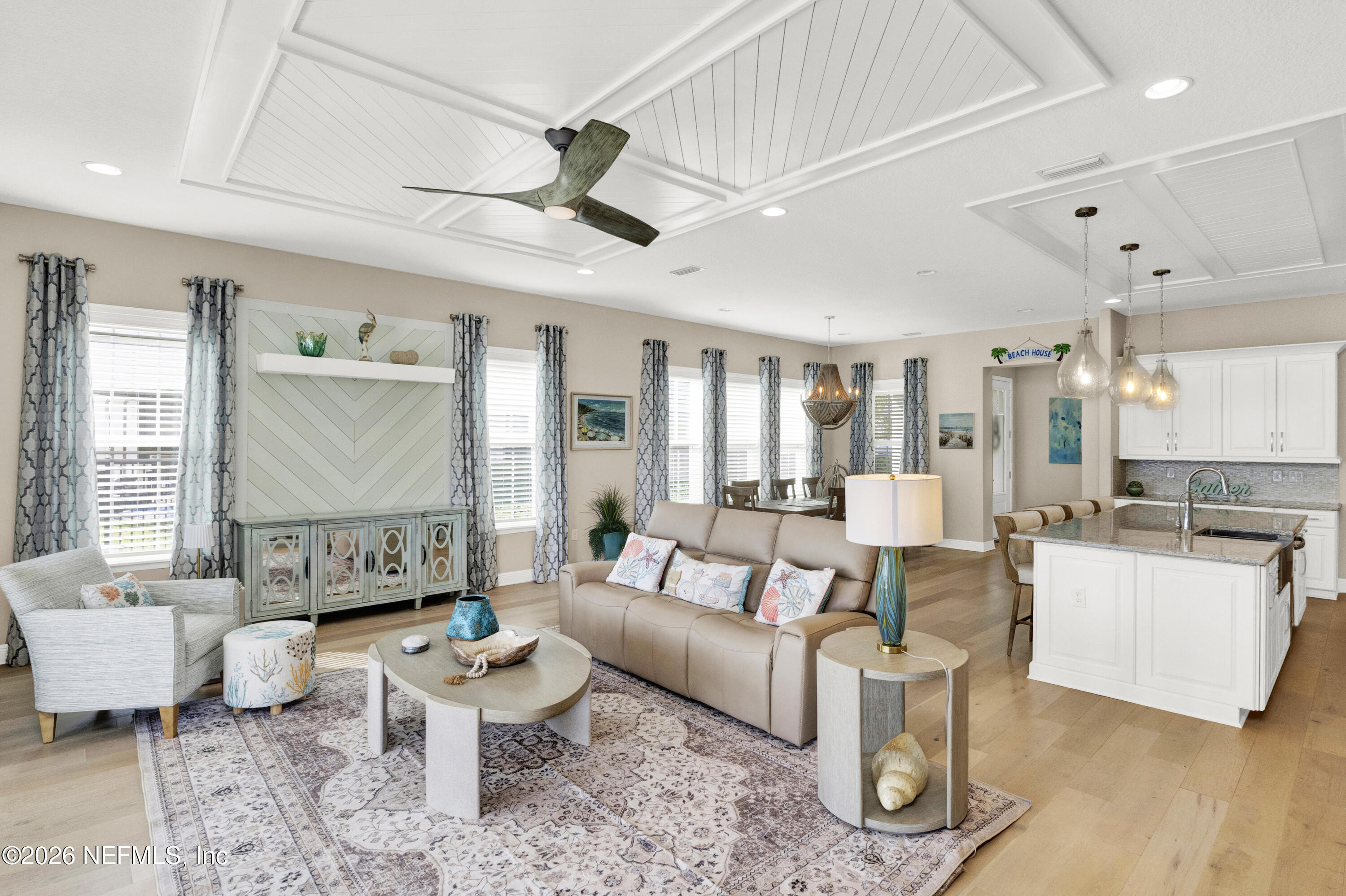 247 Rum Runner Way St. Johns, FL 32259 - Photo 12 of 42 a living room with furniture and a large window