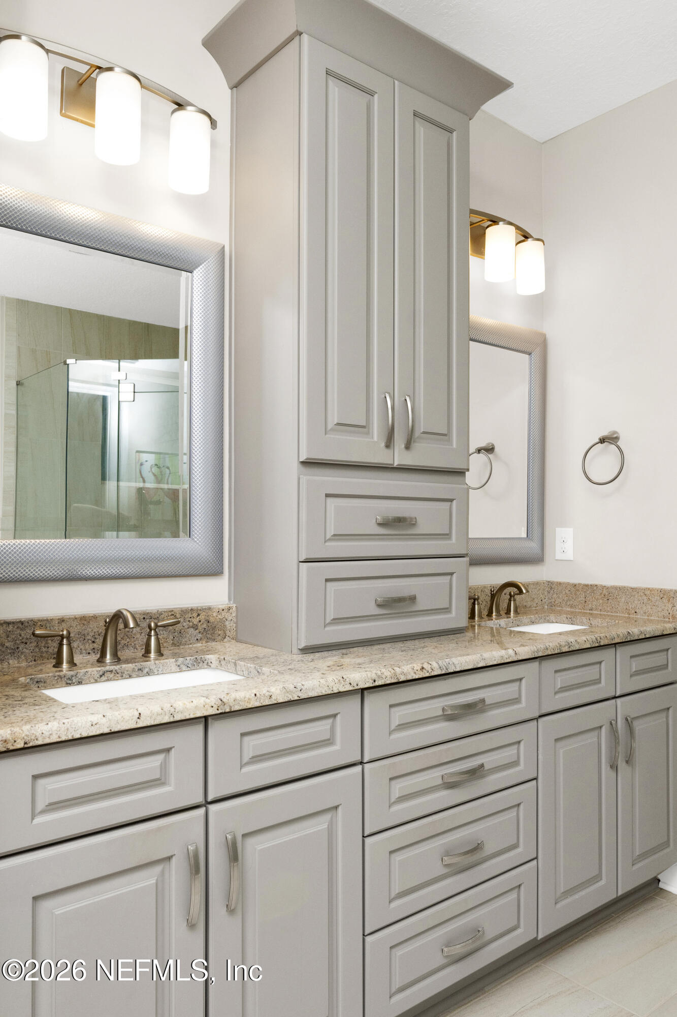247 Rum Runner Way St. Johns, FL 32259 - Photo 20 of 42 a bathroom with a sink and a mirror